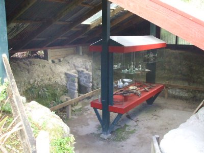 Remains of a house at the Buried Village with relics from the eruption