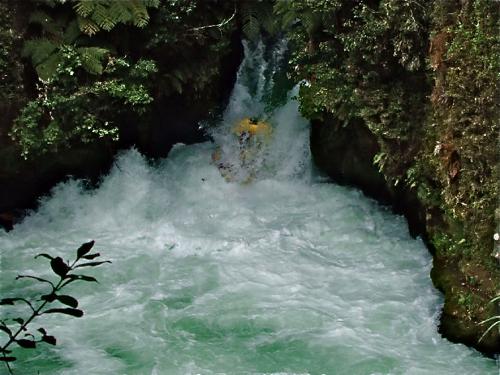 White water rafting Rotorua - Raft disappearing into the water